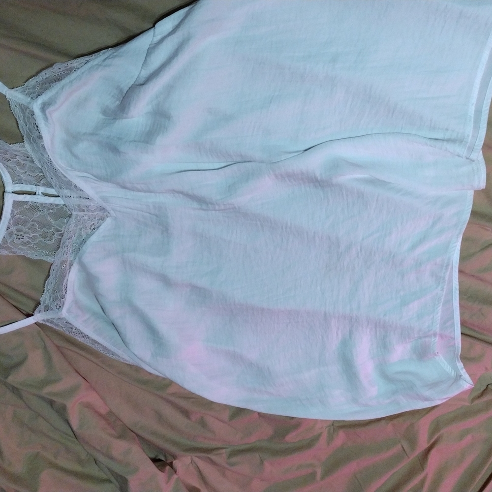Torrid size 3 white flowy shirt with lace around the top and back